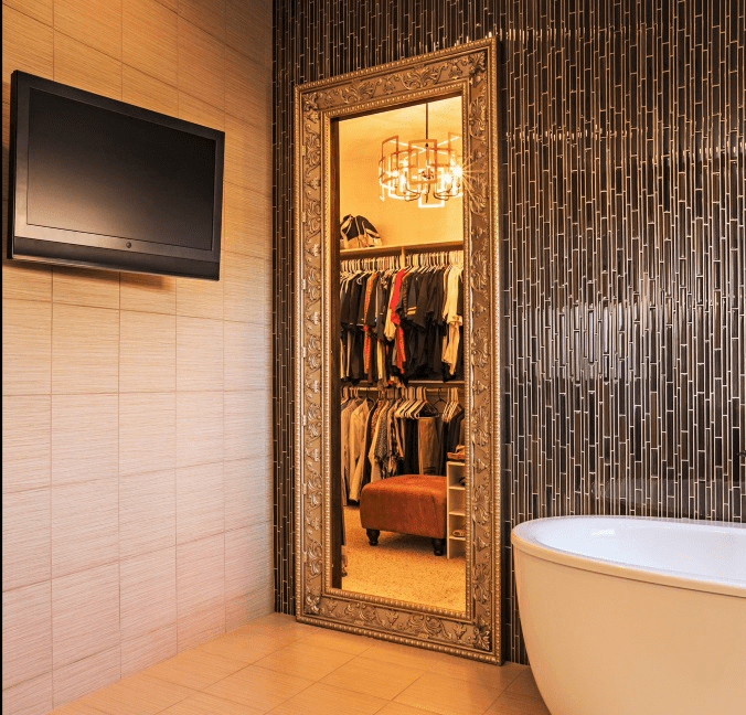 secret mirror door leading to a closet
