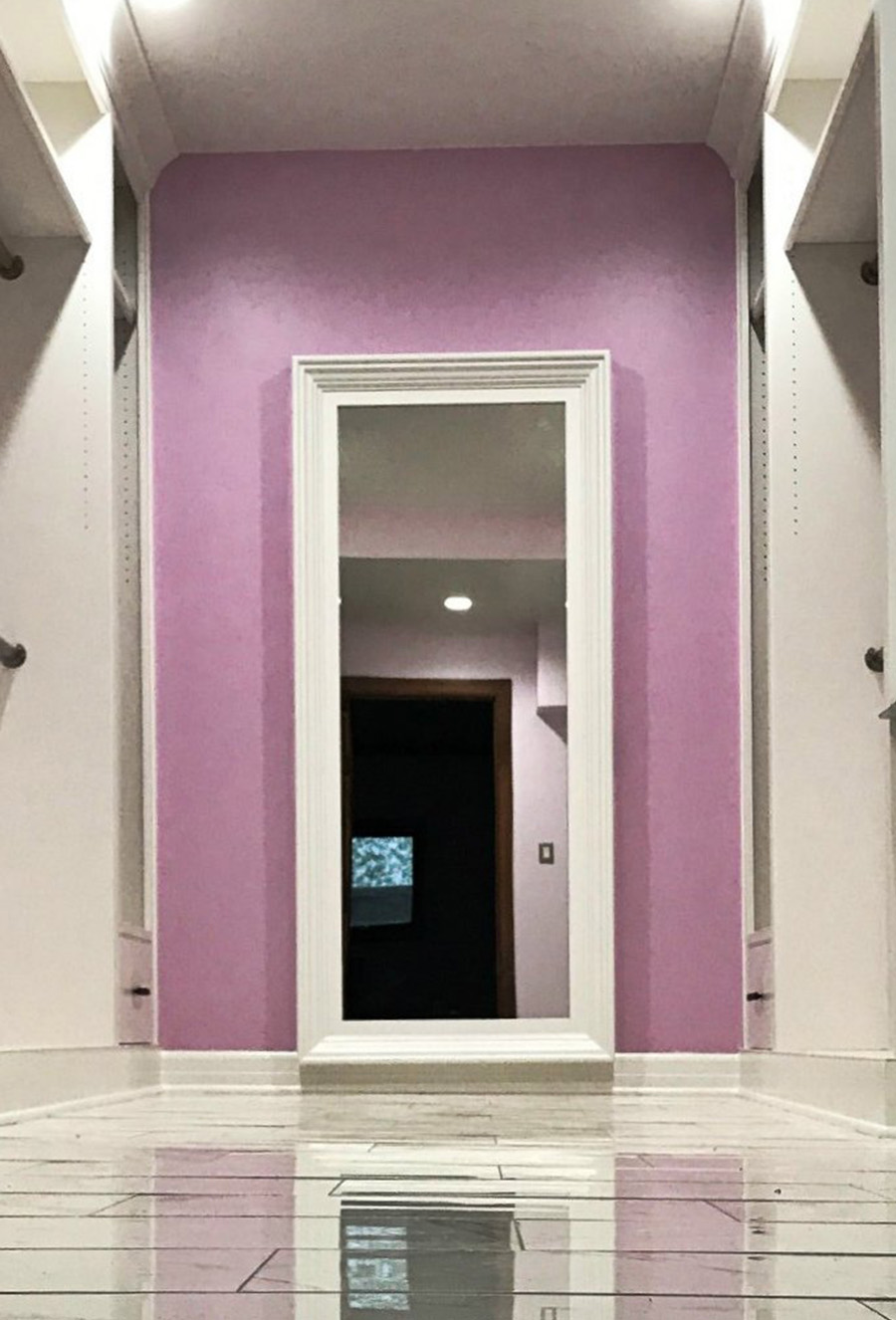 secret mirror door in hallway