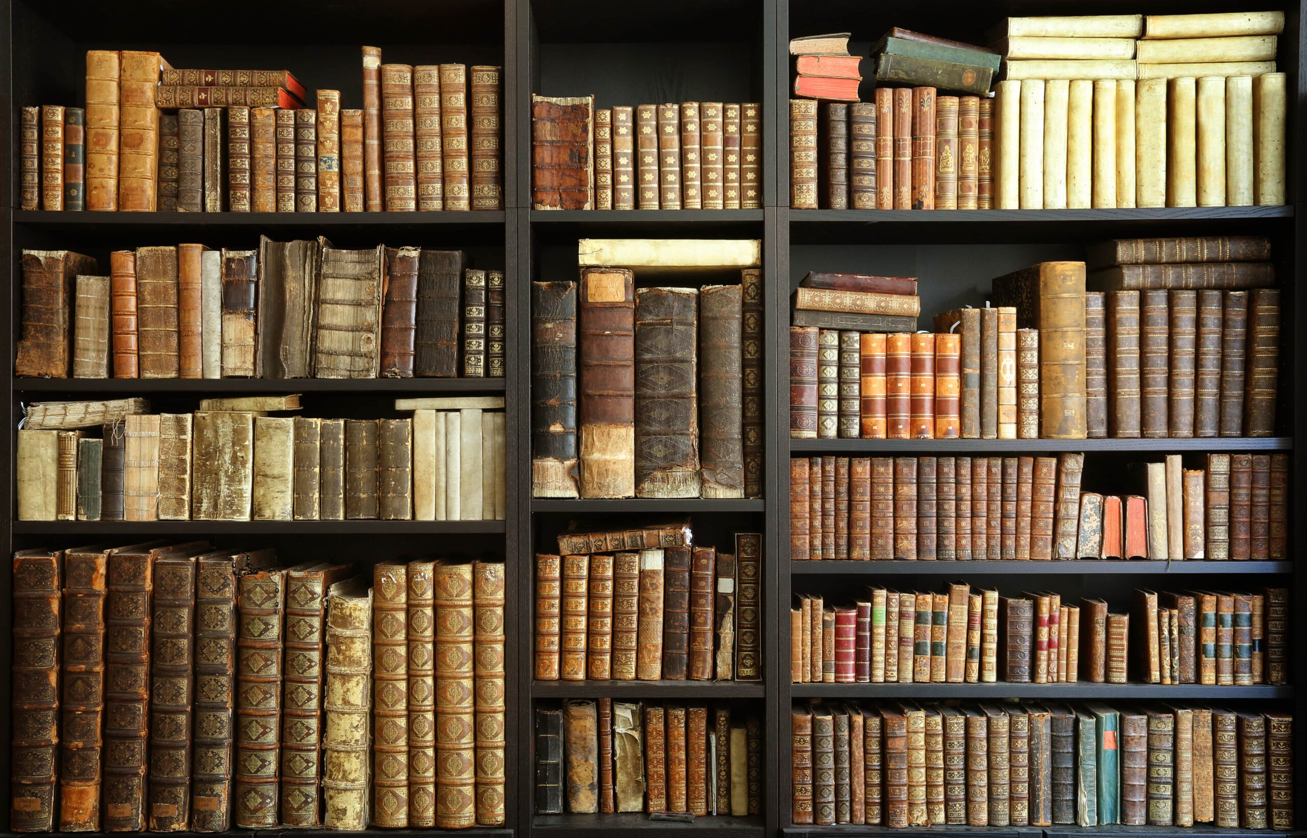 old books on a bookcase