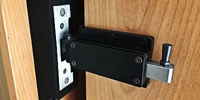 secret bookcase door latch