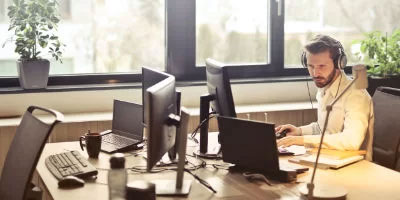 phone call operator working on a computer