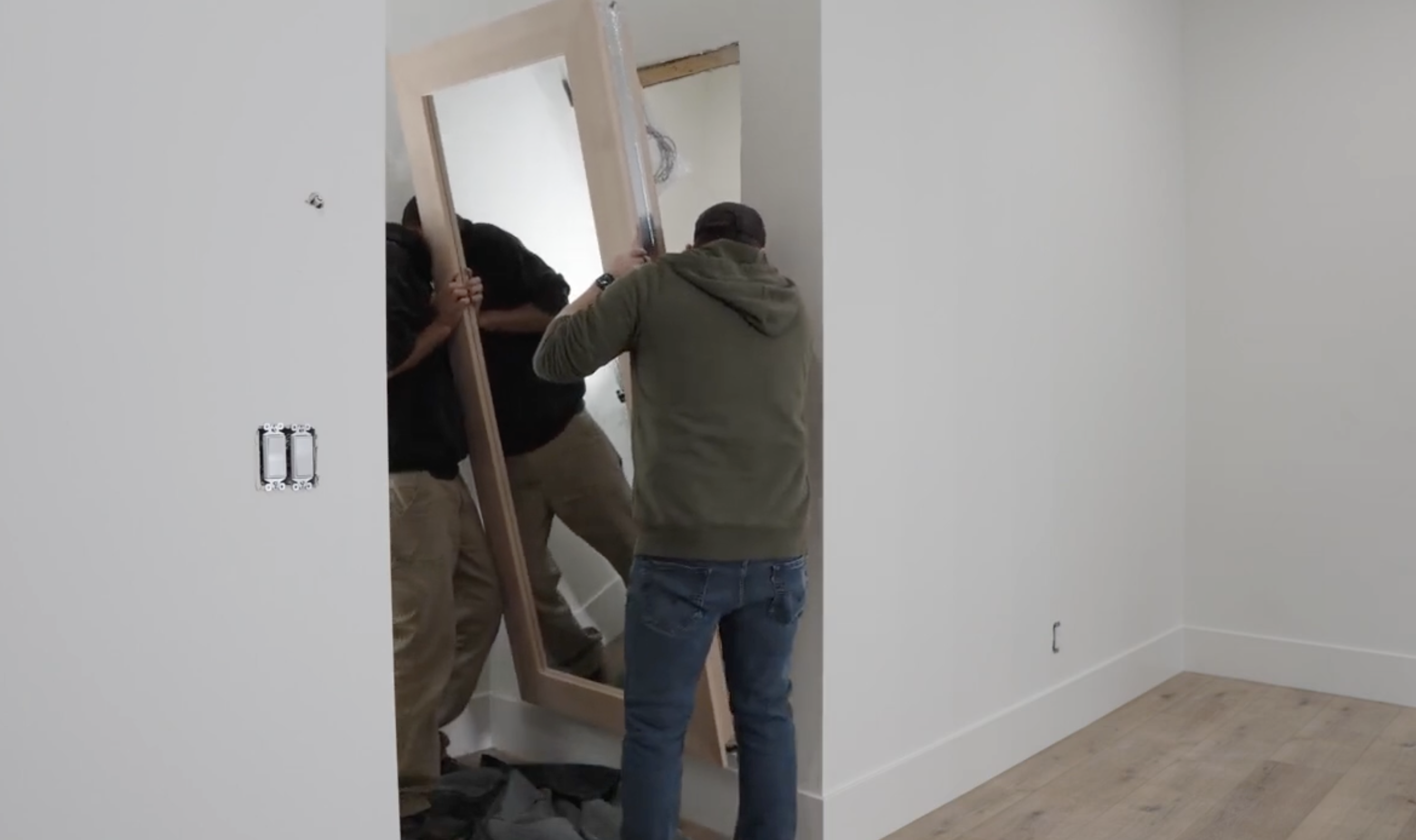Hidden Door Store installing a mirror door - Instructional Video