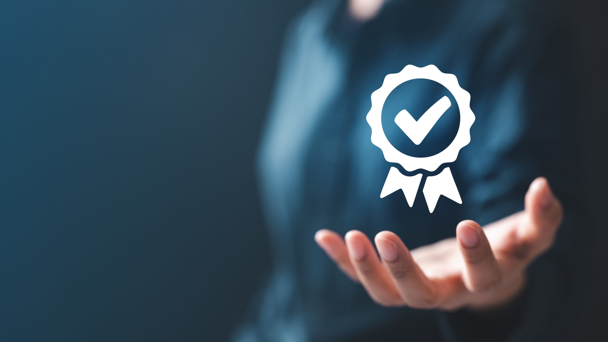 A person holding their hand out with a verification badge hovering over their hand